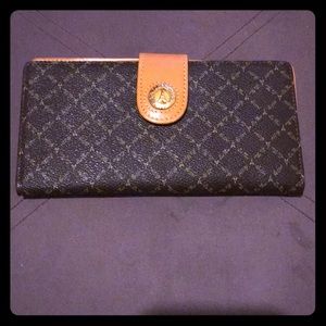 La Tour Eiffel 1887 monogrammed wallet.